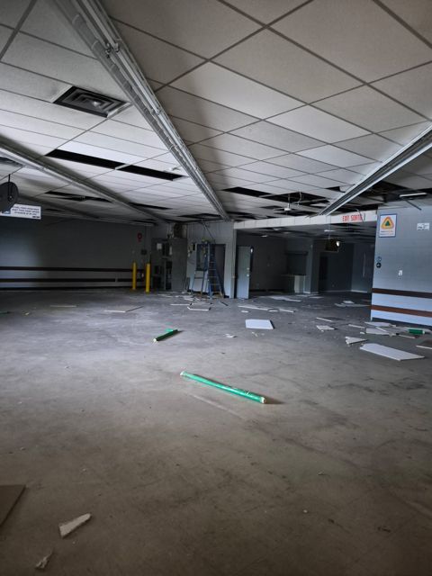 Ceiling and debris before cleanup
