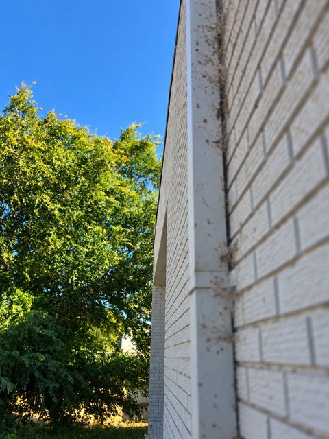 Wall and downspout, completed