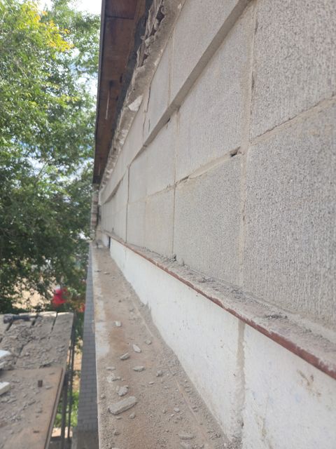Backing wall, flashing and lintel exposed