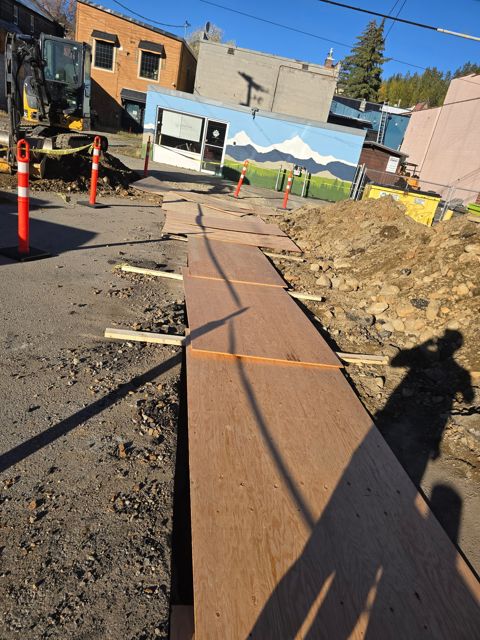 Trench plated over to keep the rear lane passable