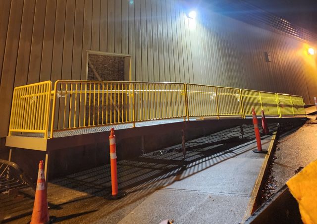 Ramp, railings and new walkway lighting at night