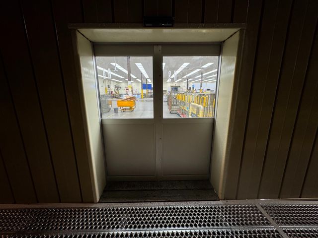 New automatic double sliding door at the ramp landing
