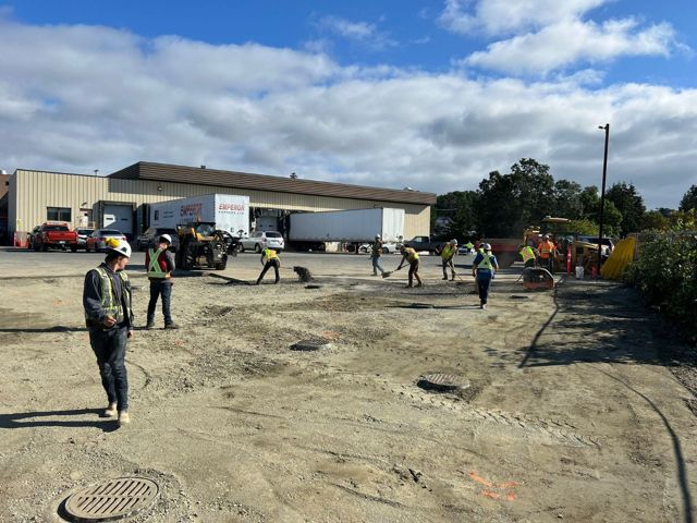 Crew on site, existing structures located