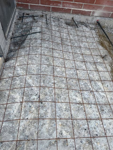 Existing concrete chipped and meshed for the new landing