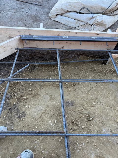 Steel edge angle and rebar at the ramp edge